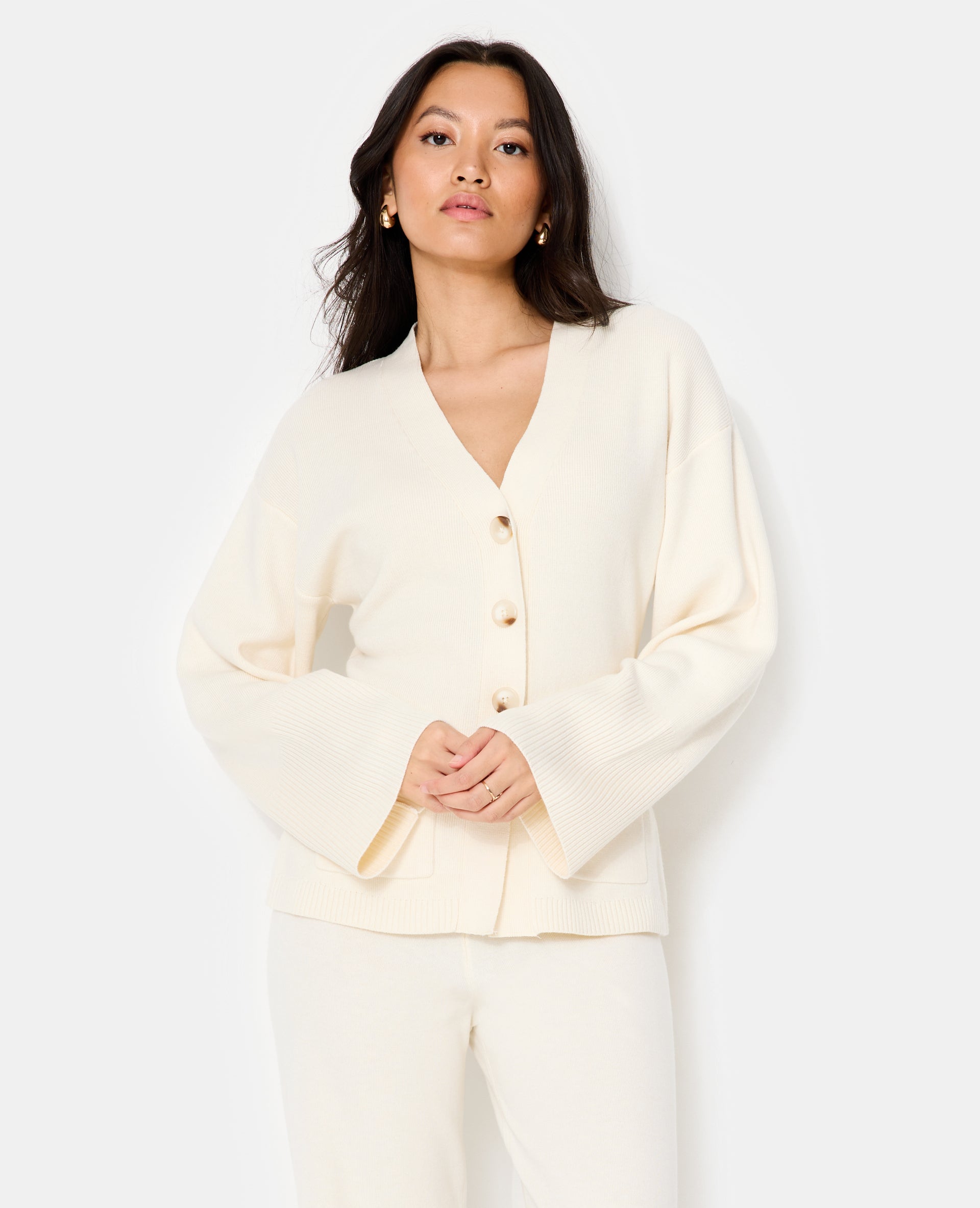 Gilet long et cintré avec poches