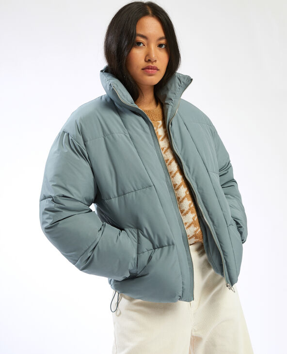 Doudoune bleu clair sale