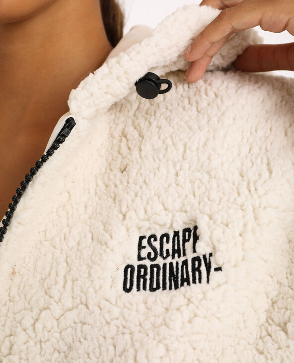 Veste courte en faux mouton